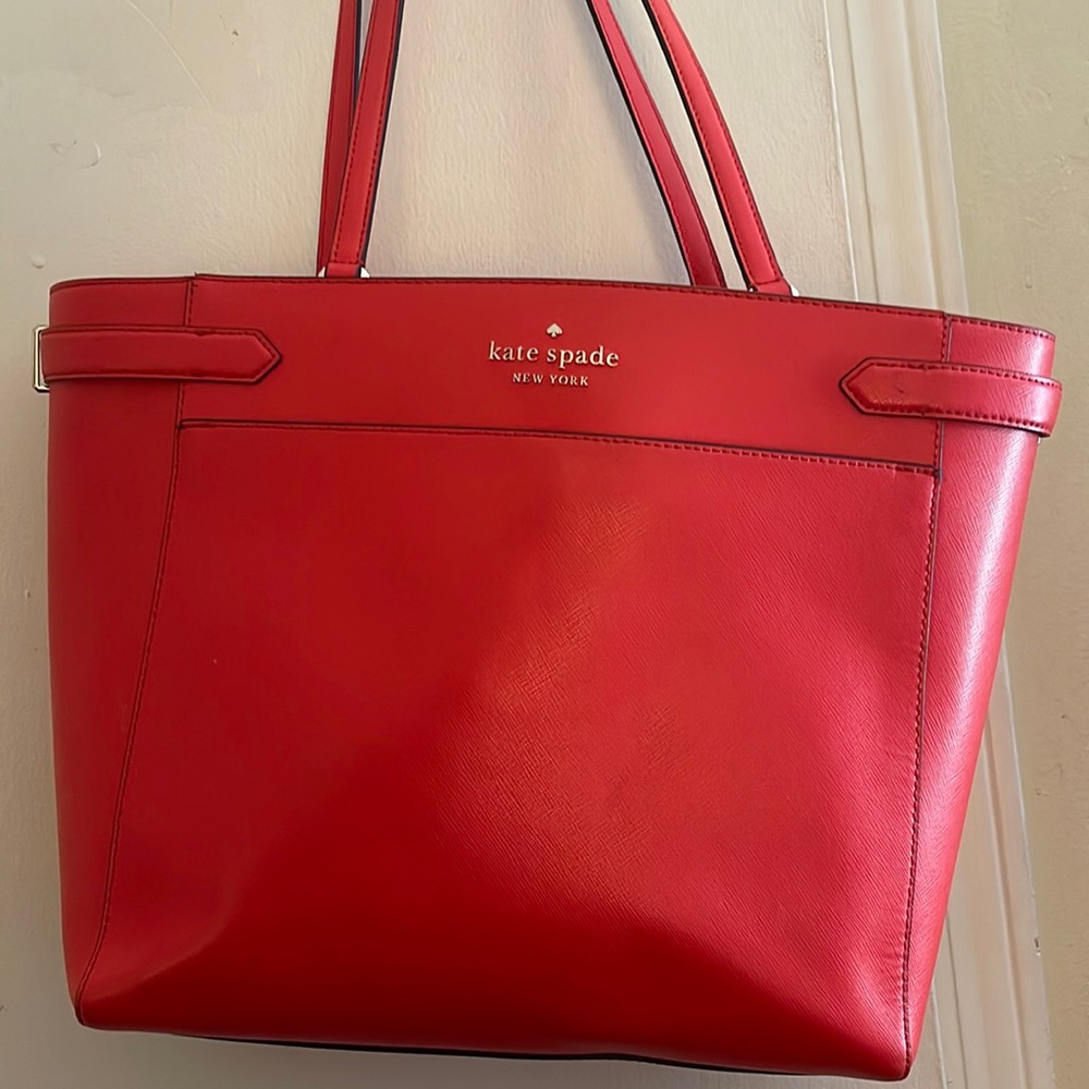 Red Kate spade bag. Fits laptop